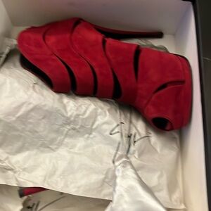 Red suede peep-toe ankle boots